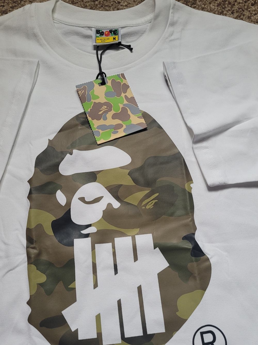 Gibson White Tee with Green & Brown Camo Ape Logo